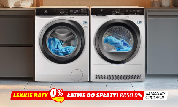 Białe pralka oraz suszarka z widocznymi niebieskimi tkaninami w bębnach. Na dole obrazu widnieje napis: Lekkie raty 0% łatwe do spłaty! RRSO 0% na produkty objęte akcją.